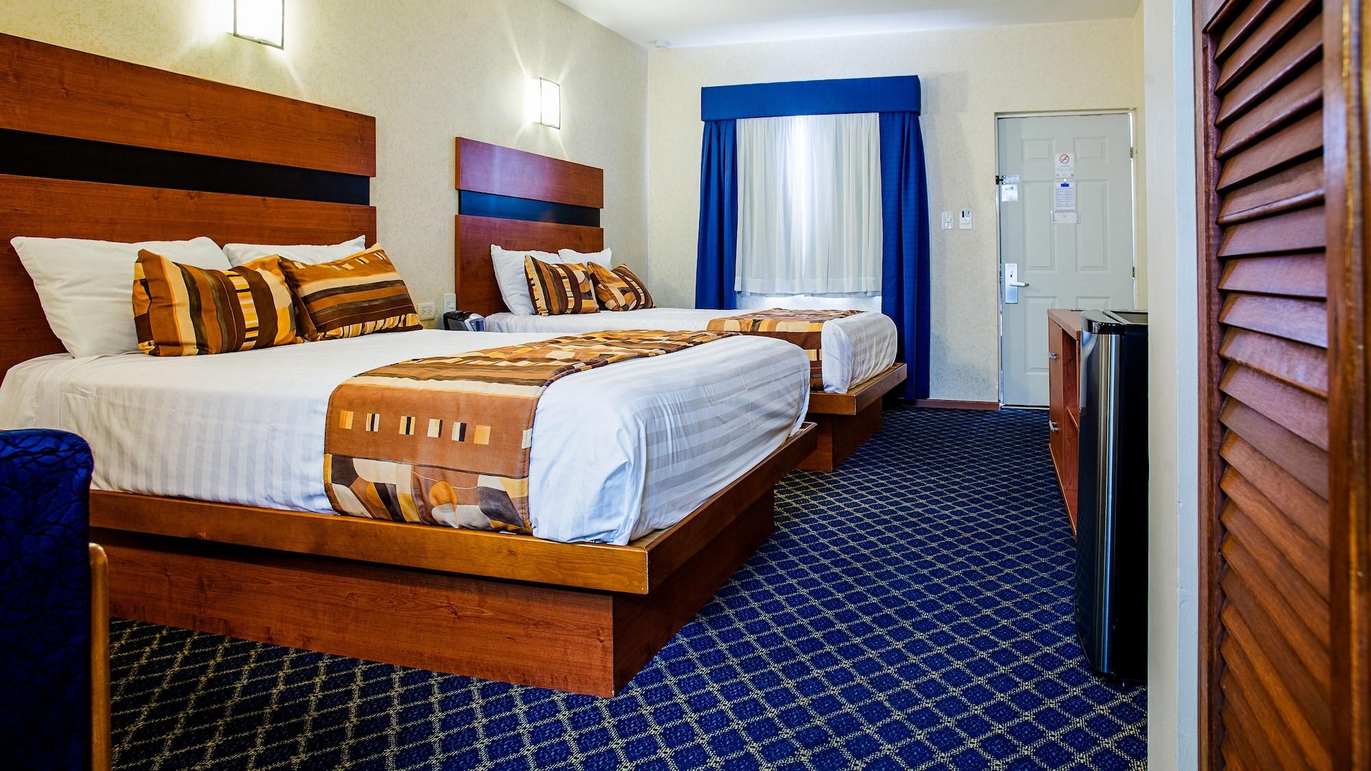 American Inn Hotel & Suites Parral Exteriör bild