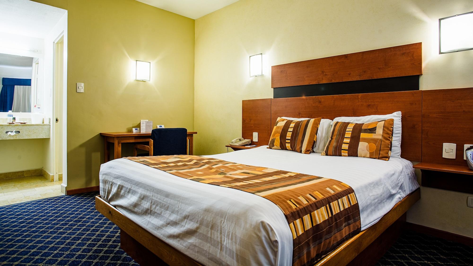 American Inn Hotel & Suites Parral Exteriör bild