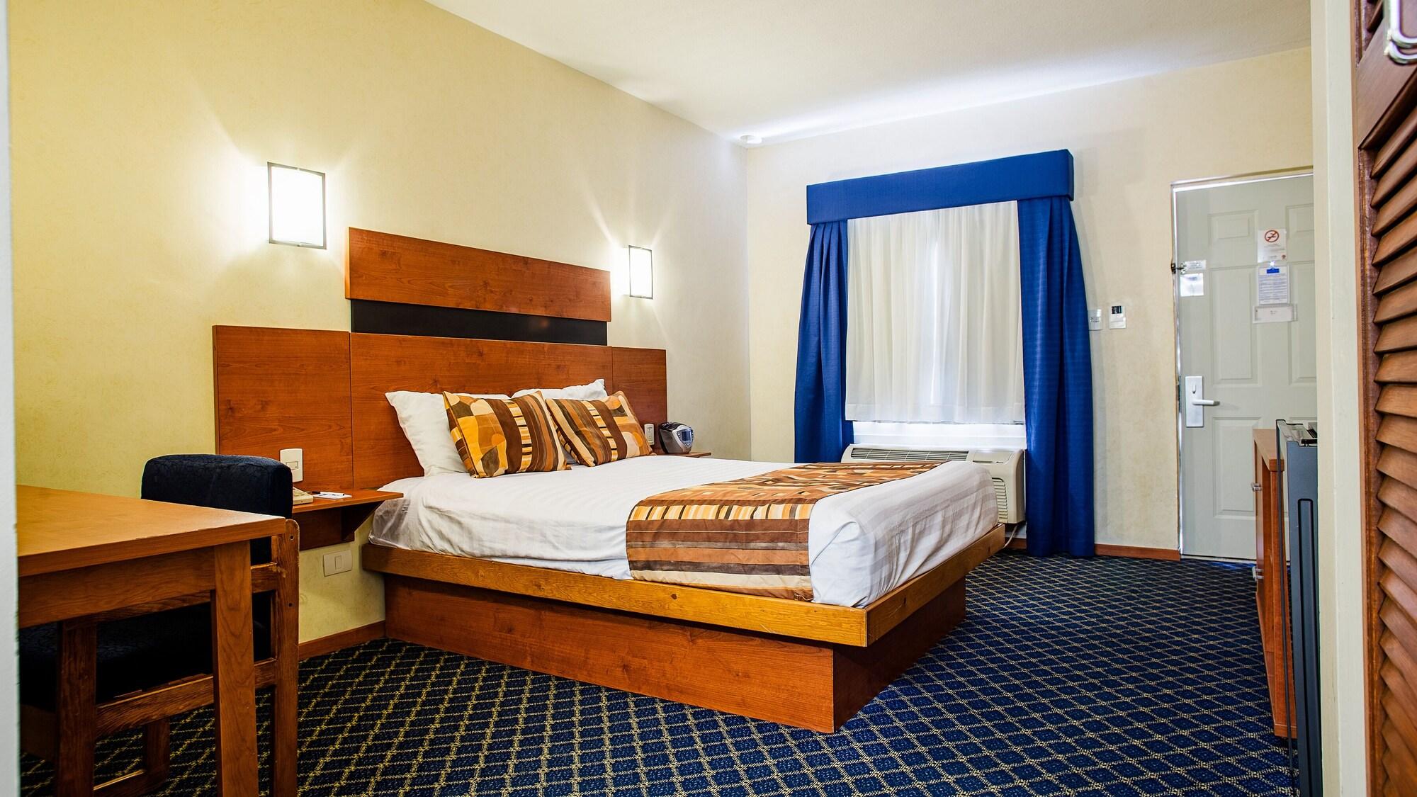 American Inn Hotel & Suites Parral Exteriör bild